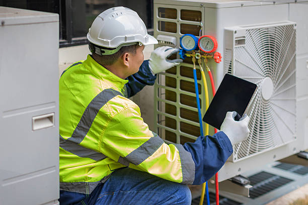 Professional Ductwork Repair technician working in Ellendale, DE